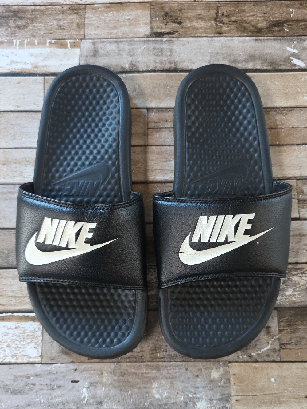 Nike Black Slides with White Swoosh Logo